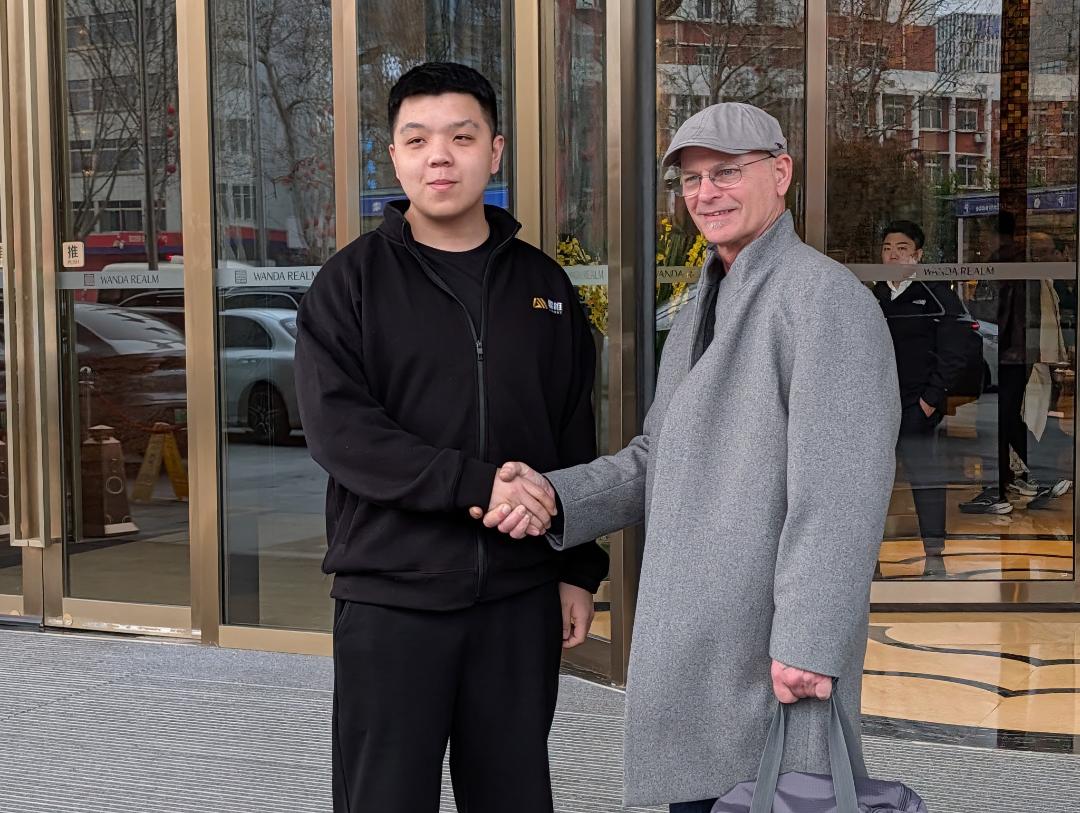 YAZIWORX factory owner handshake photo